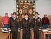 Newly formed Cass County Sheriff's Department Honor Guard present flags at commissioners meeting
